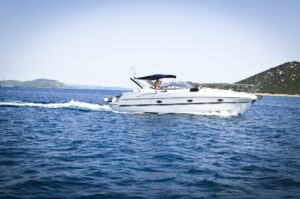 White Speedboat on Body of Water